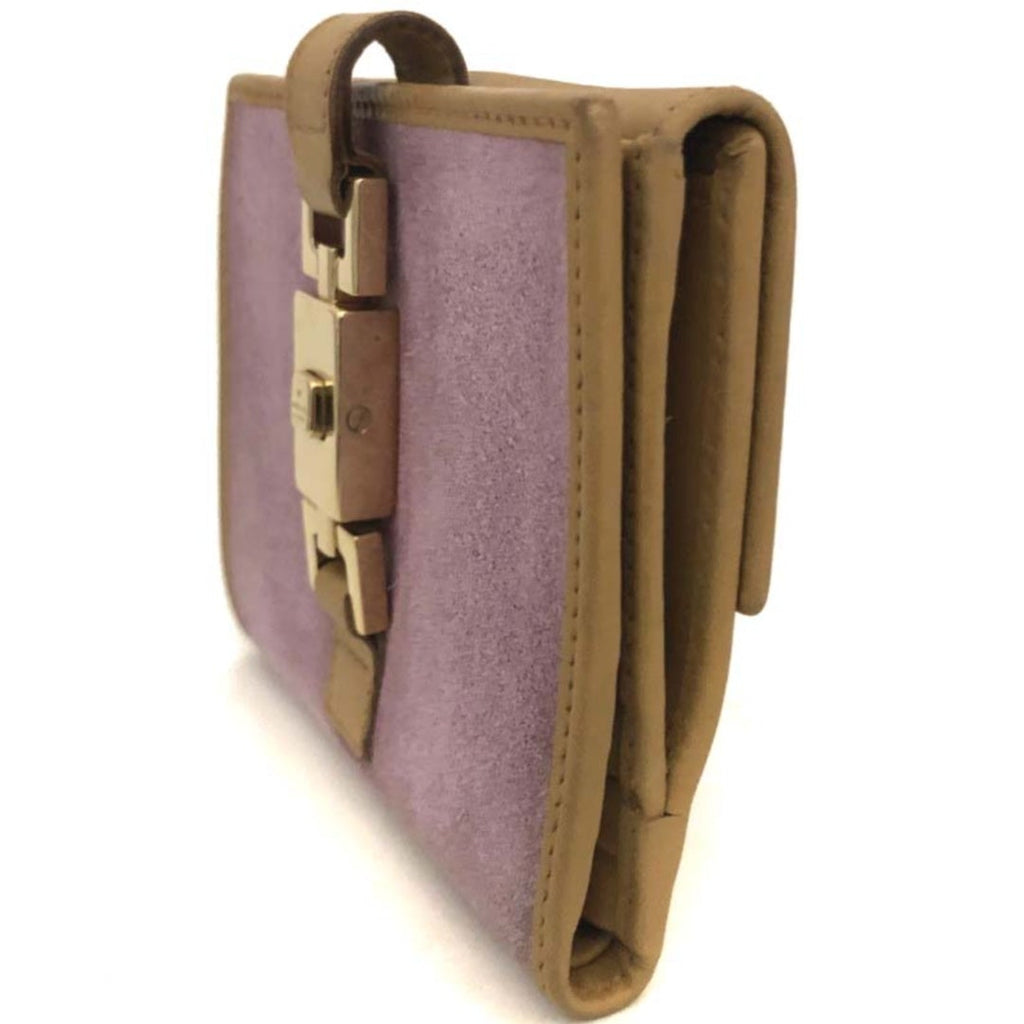 Gucci lavender suede and tan leather bi-fold wallet with a gold-tone piston-style metal closure.